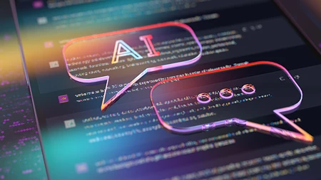 Zwei neonfarbene 3D-Sprechblasen mit dem Text AI auf einem dunklen Bildschirm mit Codezeilen.