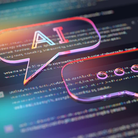 Zwei neonfarbene 3D-Sprechblasen mit dem Text AI auf einem dunklen Bildschirm mit Codezeilen.